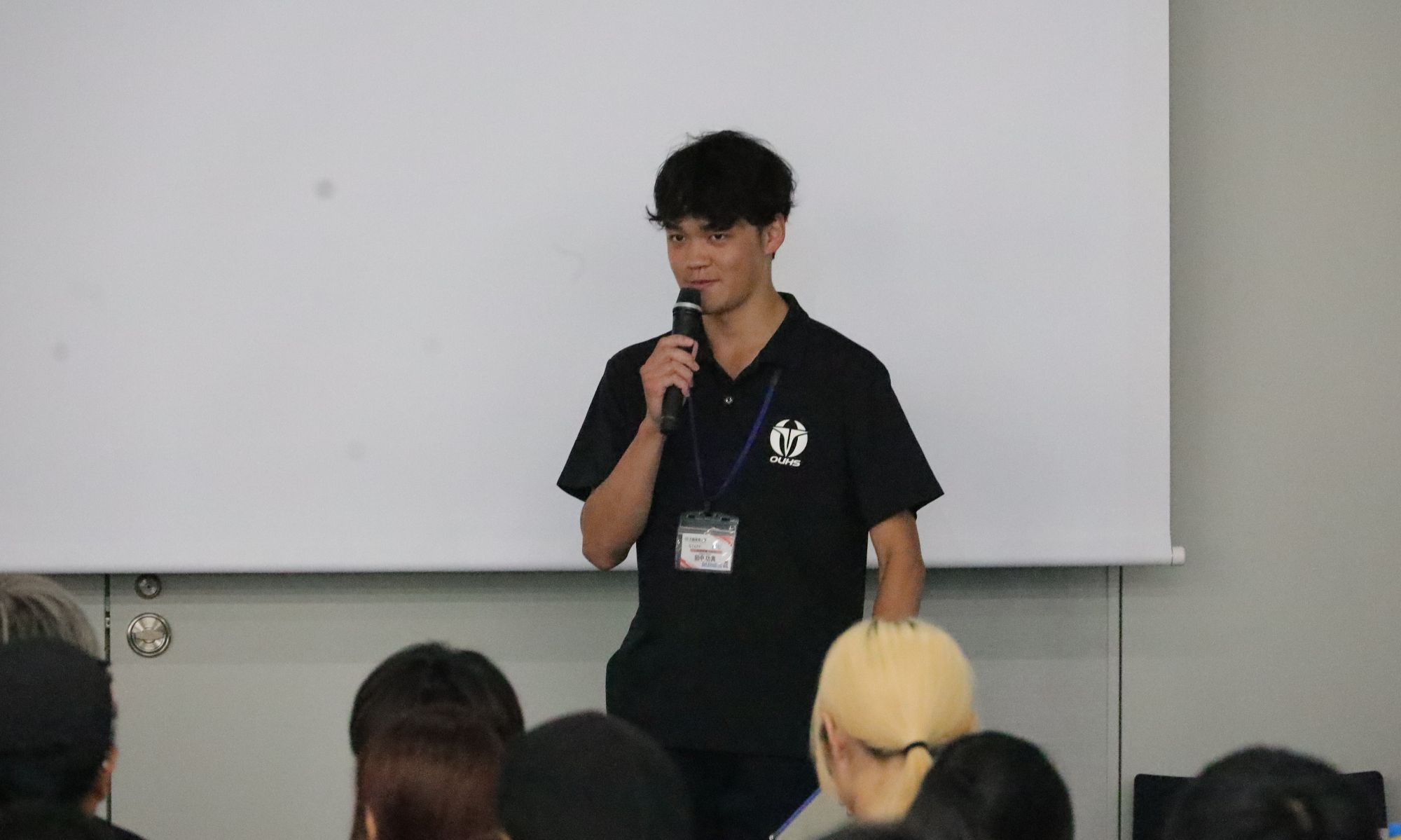 説明会の司会を務めた田中功真さん(教育学部2年、大分雄城台高校)